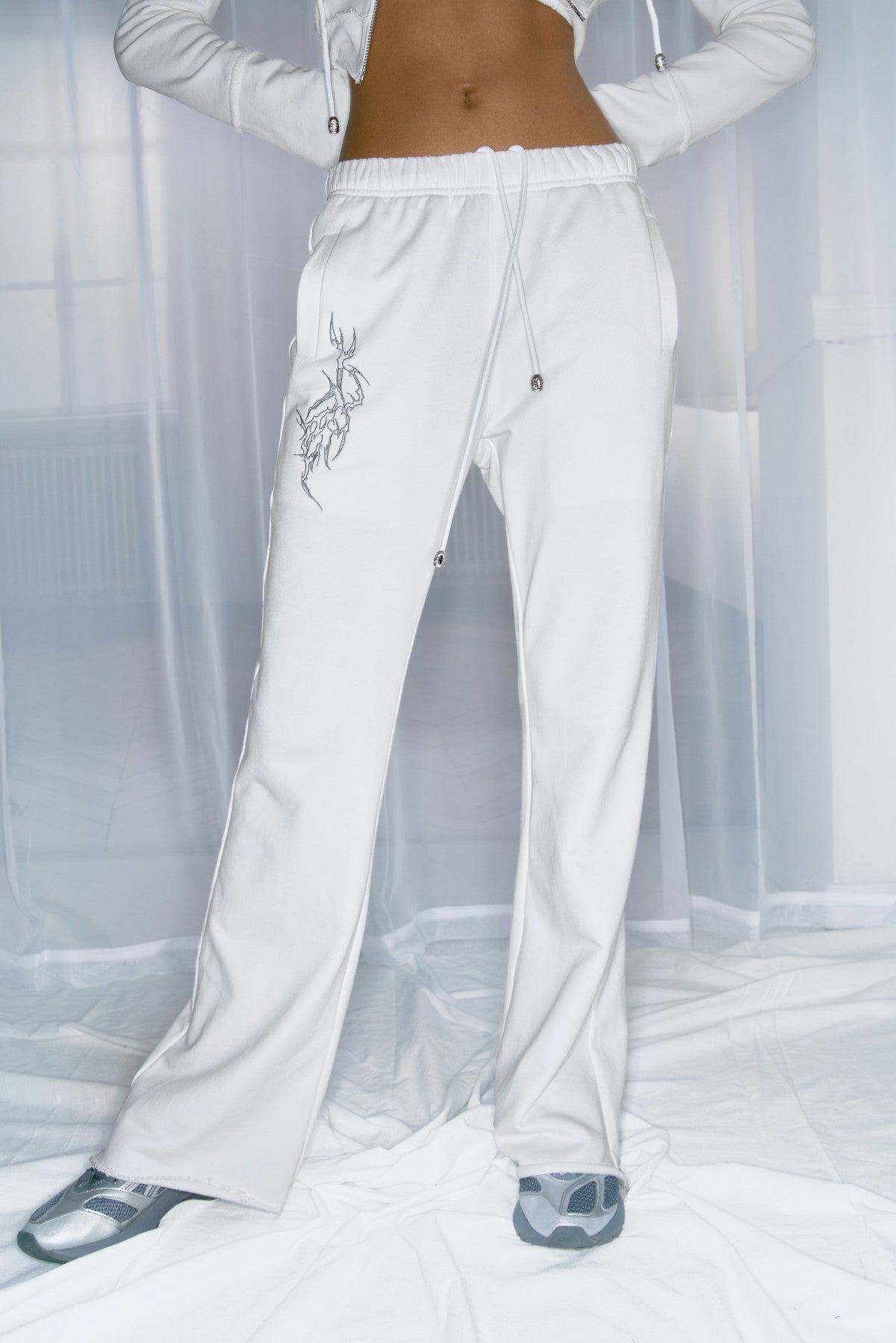 White embroidered sweatpants