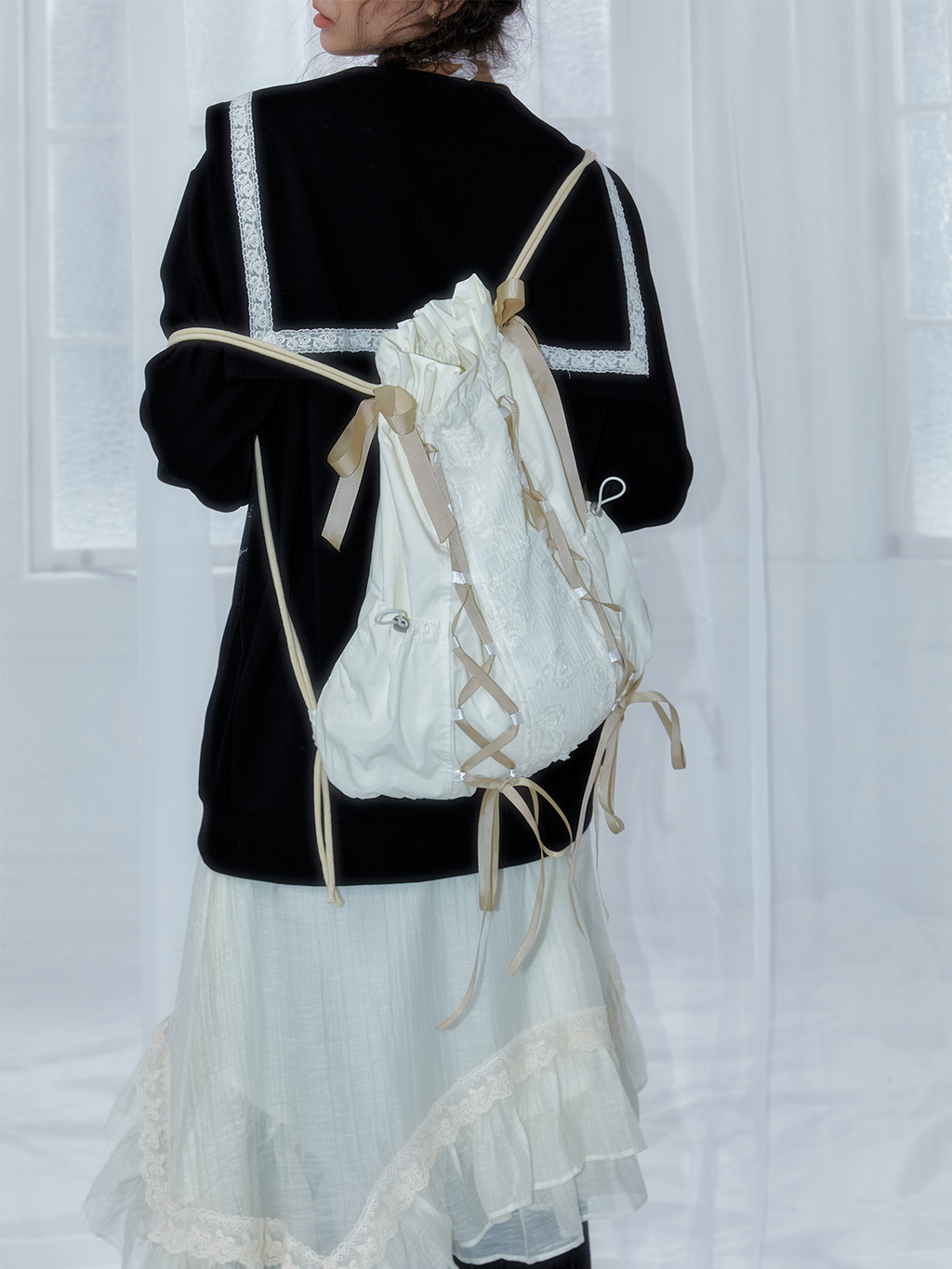 Strappy drawstring bag